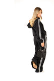 Tuta due pezzi chiusura alamaro felpa collo alto e pantaloni wide leg nero