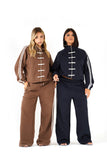 Tuta due pezzi chiusura alamaro felpa collo alto e pantaloni wide leg marrone