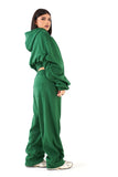 TUTA CALLIOPE VERDE CON CAPPUCCIO E MANICHE ARRICIATE