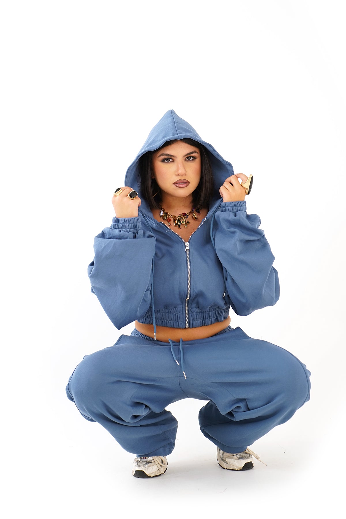 TUTA CALLIOPE BLU CLAIR CON CAPPUCCIO E MANICHE ARRICCIATE