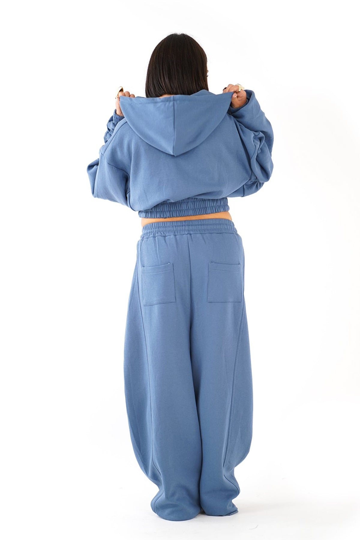 TUTA CALLIOPE BLU CLAIR CON CAPPUCCIO E MANICHE ARRICCIATE