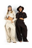 Completo due pezzi giacca cropped e pantaloni palazzo beige